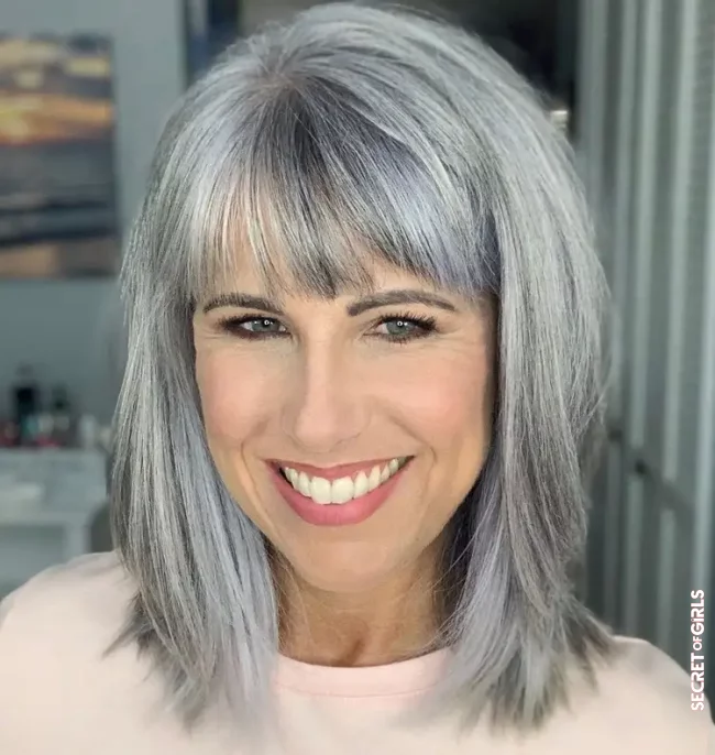 Layered bob over 50 for women with gray hair | 15 Bob Hairstyles with Bangs Over 50 - Styling Tips for Thin Hair