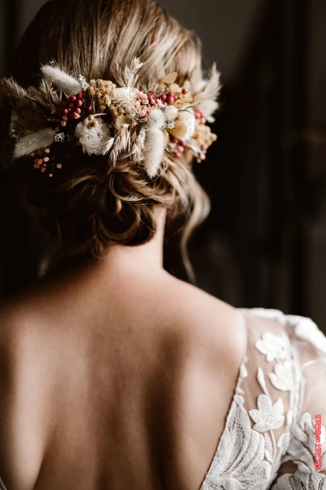 A flowery bun | Wedding: Bohemian Bridal Hairstyles Spotted On Pinterest