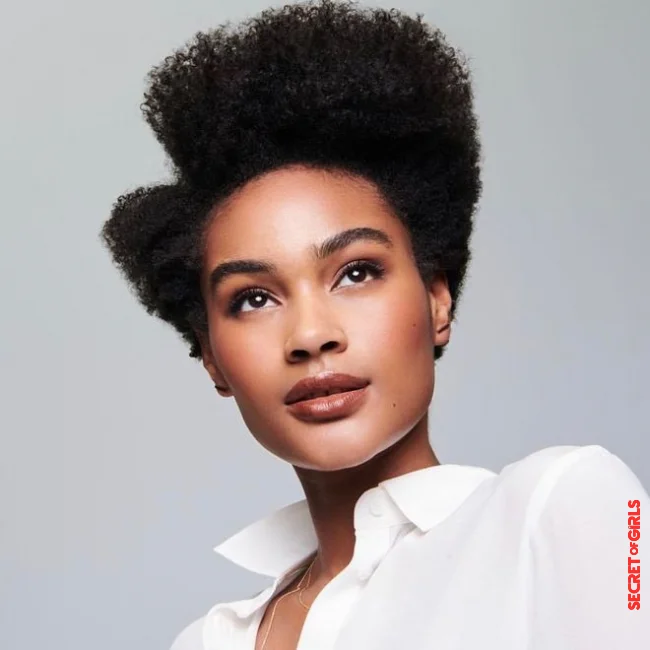 Asymmetrical short afro cut | 35 Hairstyle Ideas For A Round Face And Thick Hair