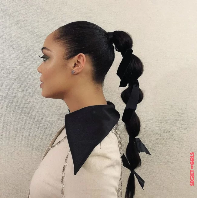 Long ponytail surrounded by knots | 30 Ultra Stylish Ways To Wear A Ponytail This Summer