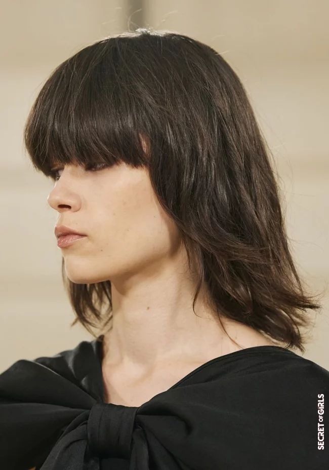 3. Blown out bob with bangs and layers | The Blown-Out Bob Provides Momentum in Spring
