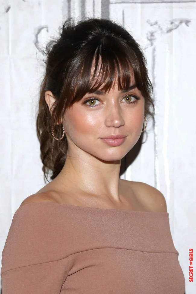 Updo with bangs | 5 Hairstyles for Round Faces That are Trending in 2022