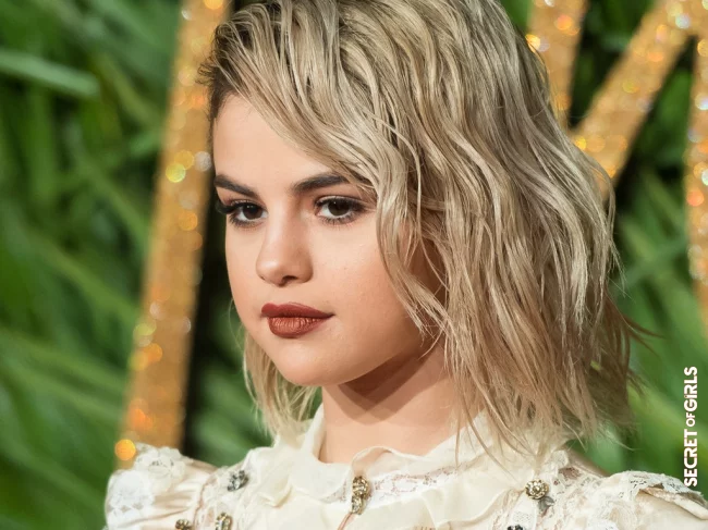 Singer Selena Gomez wears a slick look variant in blonde and with a bob. | Hairstyle Trend: Fascinating Slick Look and Wet Hair Look
