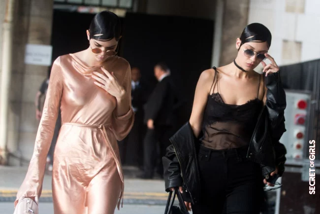 Kendall Jenner and Bella Hadid's slick hairstyles after the Givenchy show in Paris. | Hairstyle Trend: Fascinating Slick Look and Wet Hair Look