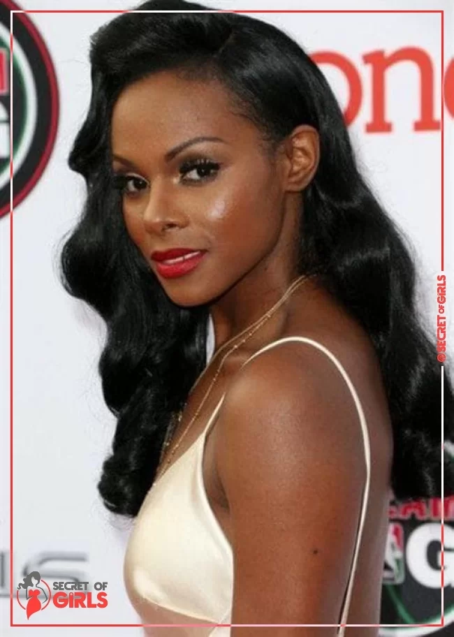 Long, straight and black | 115 Best Weave Hairstyles for 2023 That Work On Anyone