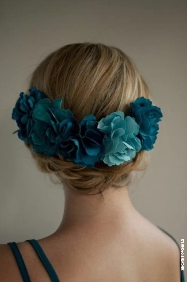 A blue flower hairstyle | Wedding: 12 Elegant Hairstyle Ideas For Guests Unearthed On Pinterest
