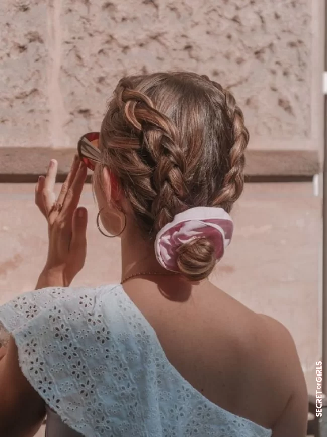 A braided bun | Summer Hairstyles: How To Tie Up Hair At The Beach With Style According To Pinterest?