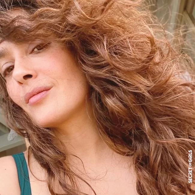 With brown, naturally curly hair: Salma Hayek posted this picture about three weeks ago | Awesome Makeover! Salma Hayek Now Wears Bright Red Hair