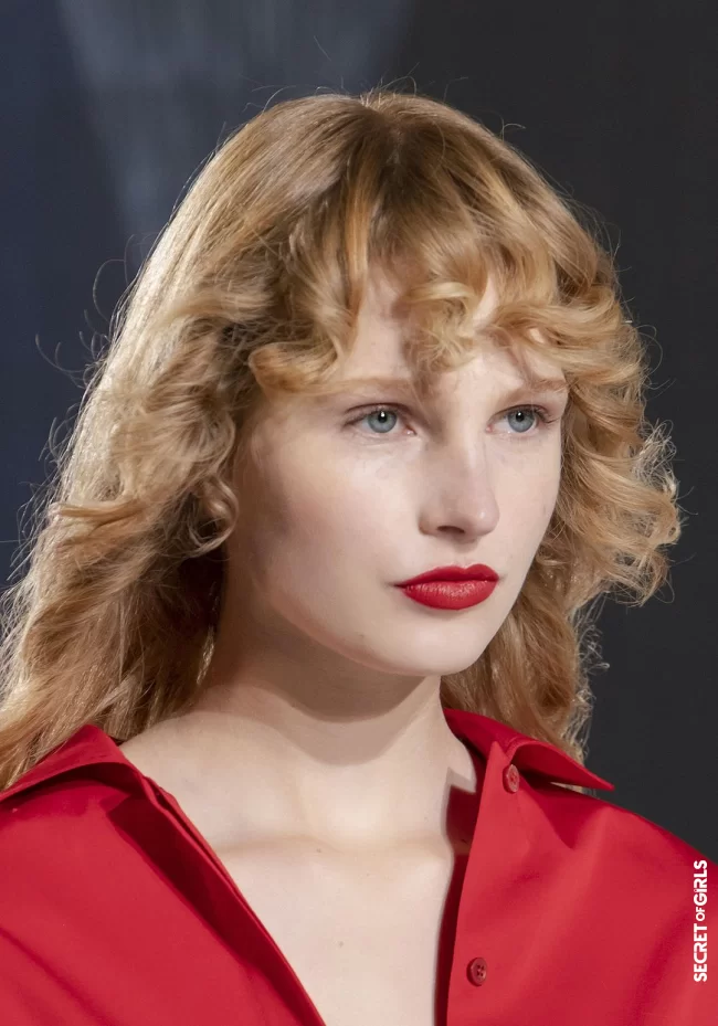 3. Casual curly fringe | Hair Trend: Casual Pony Hairstyles Loosen Up Summer 2023