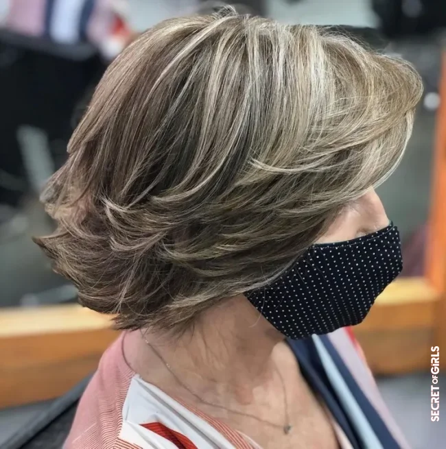 Layered feathered bob is perfect for women over 50 | Layered Bob Over 50: 6 Sassy Bob Hairstyles That Make Us Look Younger!